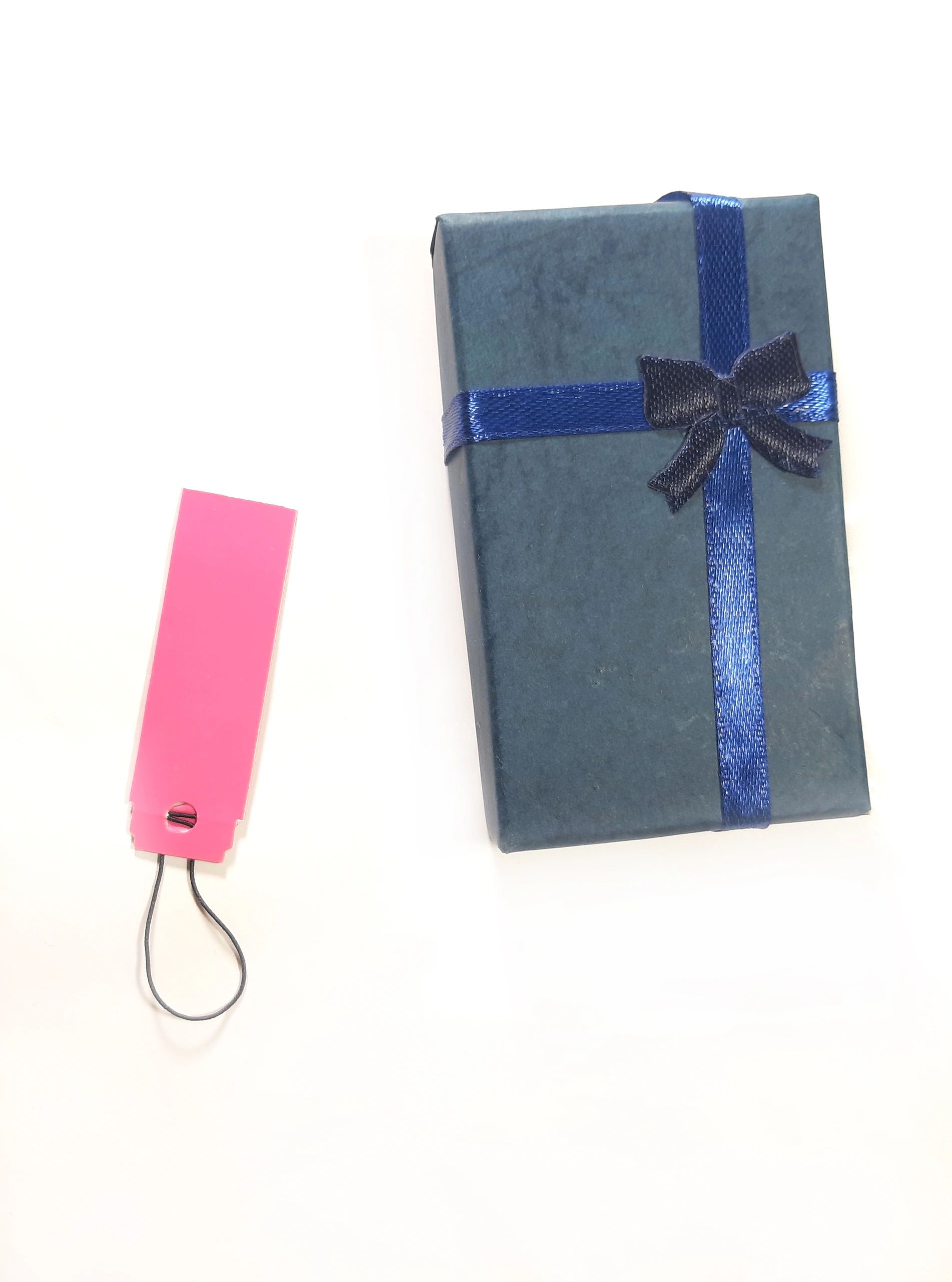 Perfume gift flat lay with elegant packaging on white background